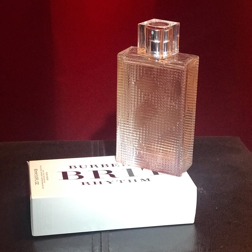 Burberry Brit Rhythm for her.